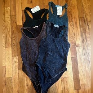 Set of Four Acid Washed Bodysuits